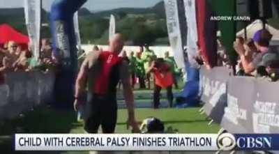 Kid with cerebral palsy finishes triathlon .