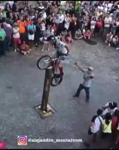 Man in bike versus Pole.