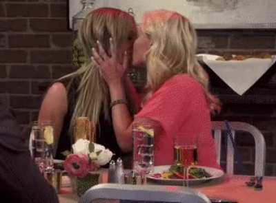 Ashley Tisdale and Emily Osment kiss