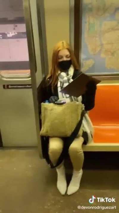 Painting a stranger on the subway results in surprise followed by tears of happiness