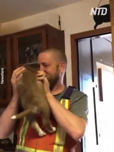 Dad overcomes with emotion when he is surprised with a husky puppy.