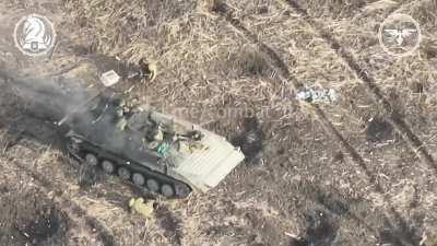 The Ukrainian national guard near Avdiivka set up defensive positions a Russian invader bmp got in there crosshairs the Ukrainians launched a fpv drone hitting the bmp disabled it. The Russian invaders getting out of the bmp got shredded by machine gun fi