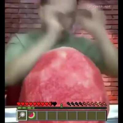 Asian guy eats watermelon at unbelievable speed.