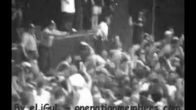 Eminem and Proof preventing a crowd rush in 2002