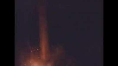 Strange creature or alien caught behind tree by Frenchmen around a bonfire late at night...