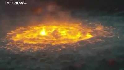 A vortex of fire under the surface of the water in the Gulf of Mexico