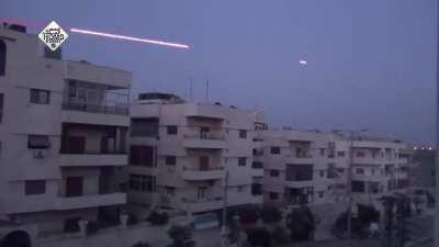 Incoming Syrian ZSU-23-4 &quot;Shilka&quot; does a number on apartment buildings in Homs - 6/20/2014