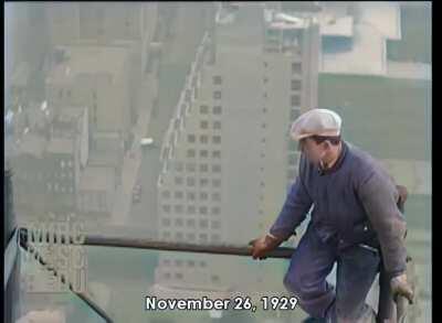 A 1929 colorized video of construction workers on the Chrysler building in New York.