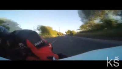 Footage of the passenger (aka the monkey) during a sidecar race in the 2014 Isle of Man TT.