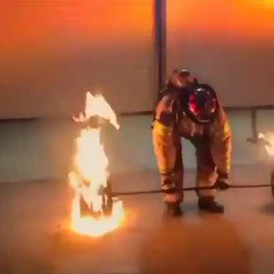 A 60 year old firefighter deadlifts 600 lbs of flaming steel to celebrate his retirement