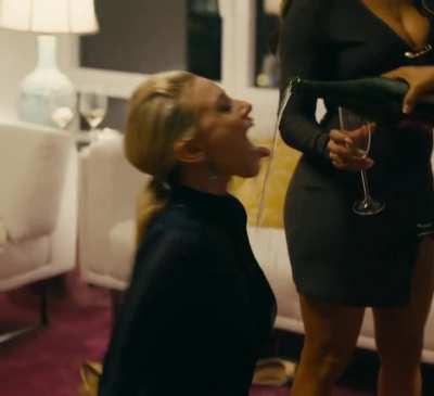 Lili Reinhart on her knees with her tongue out in Hustlers (2019)