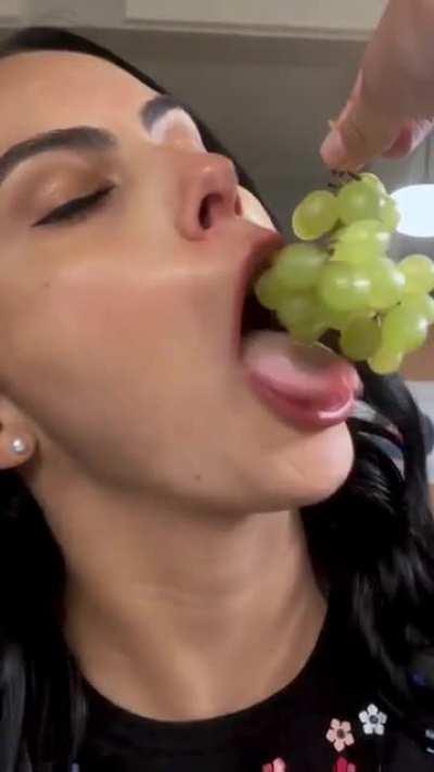 Sucking grapes