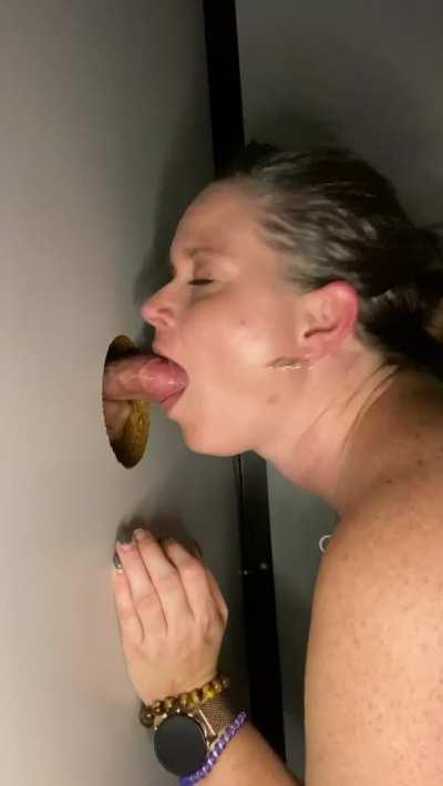 I love to gulp down warm cum through the gloryhole and feel it slide down my throat.