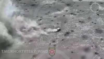 A Russian BTR carrying infantry hits a mine near Novobakhmutivka during an attack, the survivors are targeted by Ukrainian artillery (April 2024, Avdiivka front)