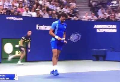 Tennis player catches ball in shorts pocket