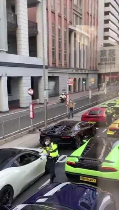 45 supercars getting pulled over in Hong Kong