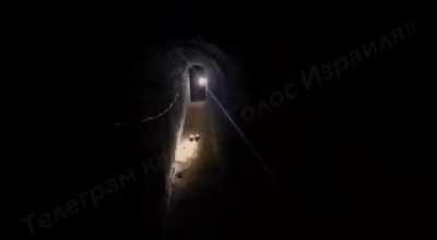 Hamas combatants in one of the newly flooded tunnels