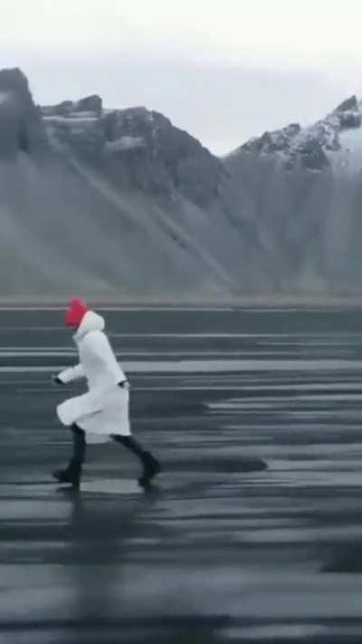 Strong winds move the black sands of Iceland, making it look like snakes.