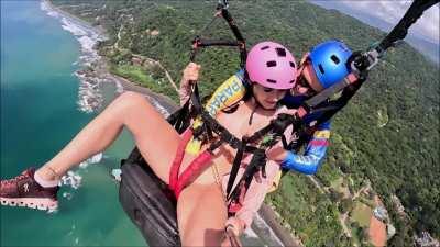 While tandem paragliding