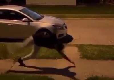 Man does a full frontal flip from an incline plank position