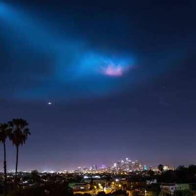 SpaceX falcon 9 leaving Earth's atmosphere and creating a &quot;Twilight Phenomenon.&quot; from /r/interestingasfuck