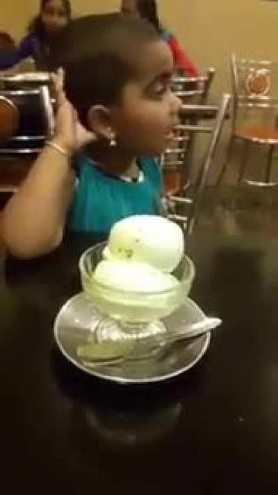 little girl didn't notice her favourite ice cream had arrived. Her reaction afterwards is priceless.