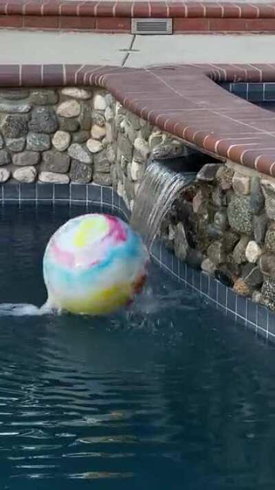 Ball stuck in a water fall