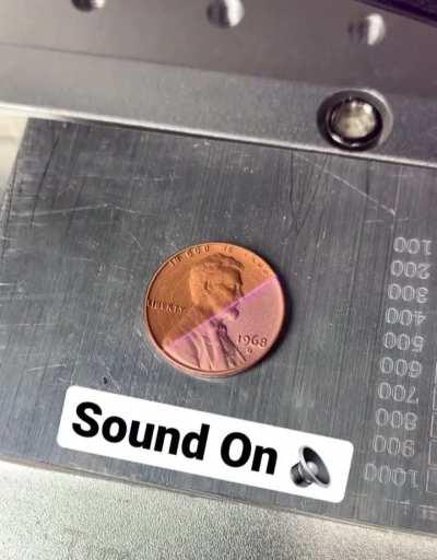 Laser restoring a coin