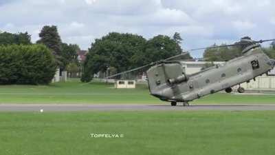 Skilled Chinook Pilot Does A &quot;Pinnacle Landing&quot; Then Climb Away Backwards