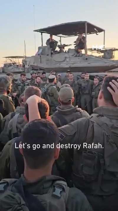 Israeli soldiers are seen gathering around ahead of an attack on Rafah, with a soldier rallying the troops and urging them to 