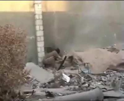 Al-Qaeda militant uses handheld mortar to strike coalition forces when a faulty round takes him, iraq, unknown date.