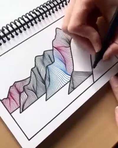 This artist drawing beautiful mountains.