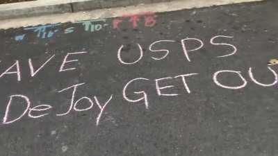 Protesters Surround USPS Postmaster General DeJoy's house.