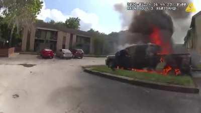 Austin police save man from burning car.