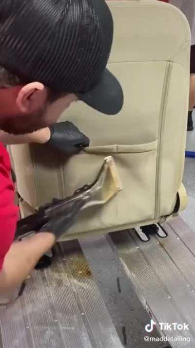 Detailing a very dirty car seat.