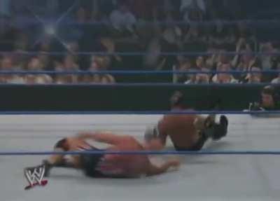 Kurt Angle suplexing Rey Mysterio