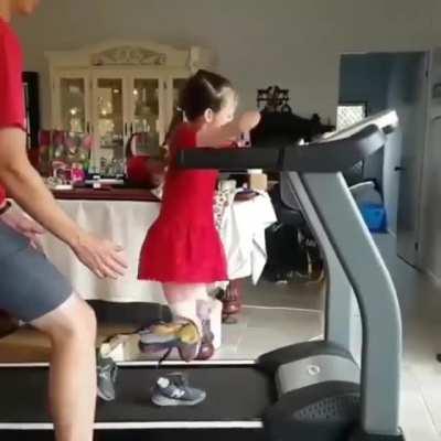 This girl being able to walk on a treadmill with her prosthetic legs