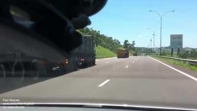 Runaway truck has its brakes fail, uses arrester bed to do emergency stop