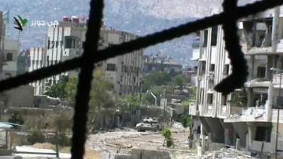 Syrian Army tank targets the camera building in Jobar, Damascus - April 2013