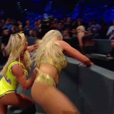 Carmella getting payback for the divas Charlotte gave wedgies too