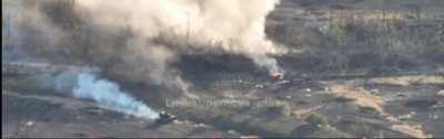 A Ukrainian tank hitting Russian forces at close range