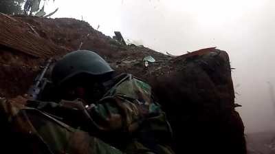 A fighter from KIA/PDF in Kachin Stare barely escaped the air assault. His ears must be ringing for a while.