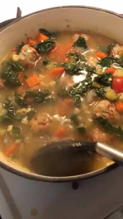 I made a loaded veggie soup with onions, carrots, celery, tomatoes, garlic, kale, and chicken meatballs.