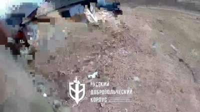 A fighter from the Russian Volunteer Corps ambushes a Russian Tank (00:14). Kozinka, Belgorod Oblast.