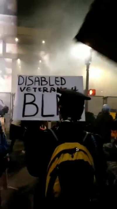 Disabled vet takes a direct hit from a flashbang outside the Portland courthouse last night