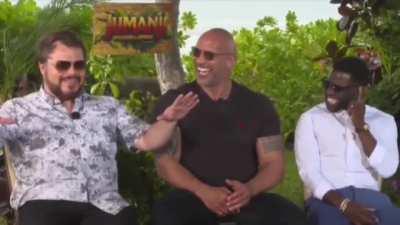 Kevin Hart and the Rock crack up over Jack Black's impersonation.