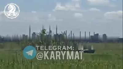 Russian footage of their tank being hit by a Ukrainian FPV drone Strike Drones Company (UA) with a detonation that followed. Location: Krasnohorivka near Avdiivka