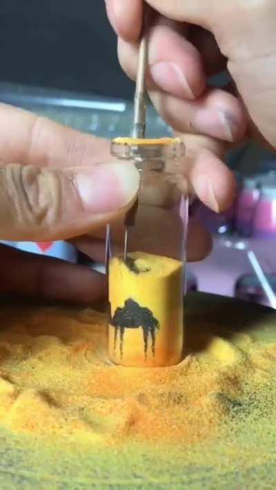 This is a traditional camel in a jar souvenir art from Petra, Jordan