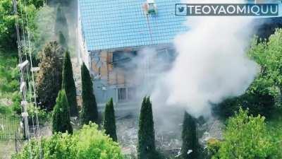 Ukrainian soldiers approaching a Russian held building. Eventually, Russians decide to surrender after being outnumbered. Location 50.252562, 36.402528