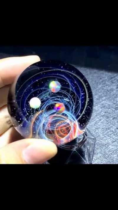 Twisted space glass sphere